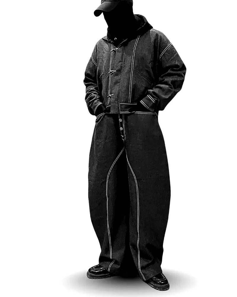 Model in the gray clasp jacket and wide trousers
